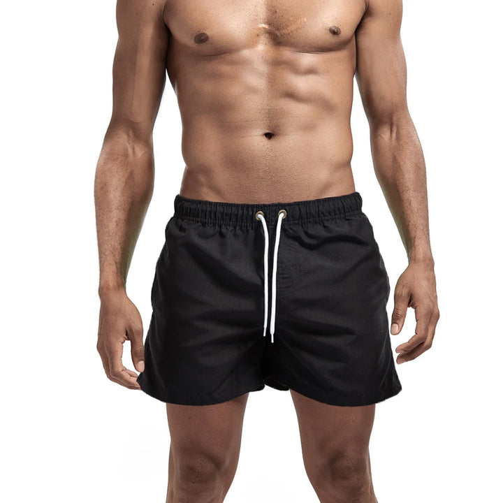 Bañador corto para hombre, de secado rápido, transpirable, con cordón y bolsillos para surfear en la playa en verano.